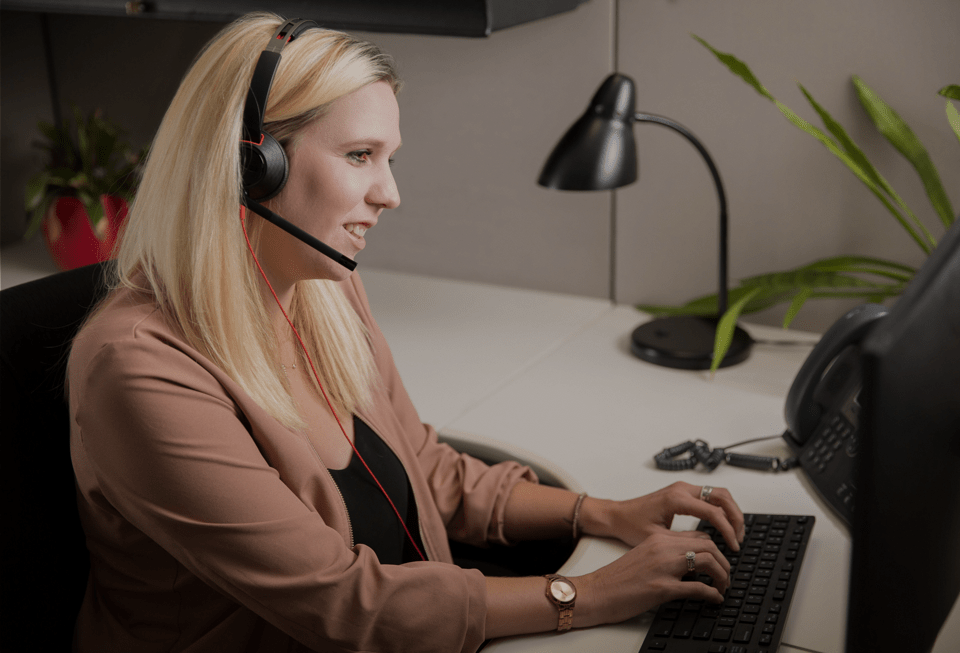 Photo of a woman taking at call in the Legal Aid Alberta Contact Centre