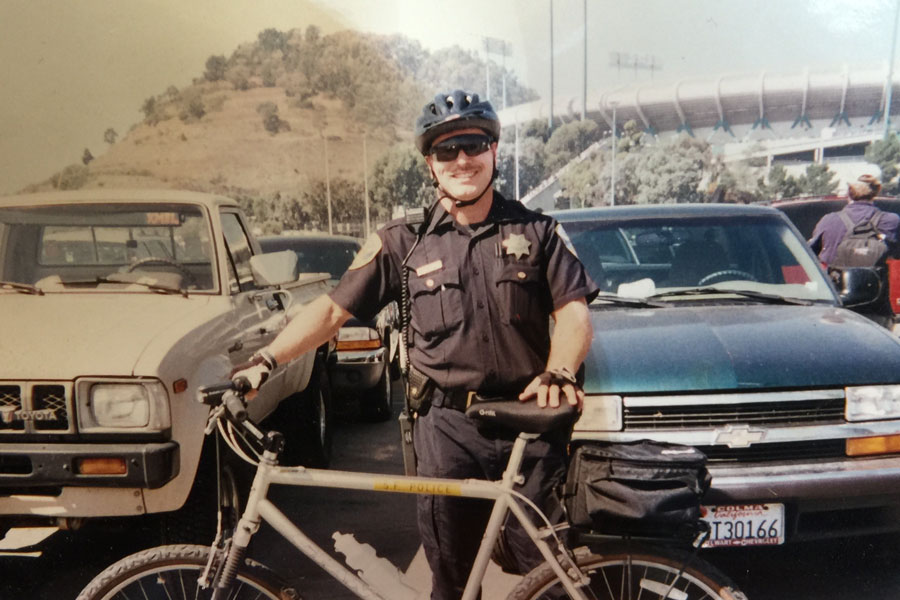 LAA lawyer Chuck Easton was a police officer in his earlier years. In this photo he poses outside Candlestick stadium in San Francisco.